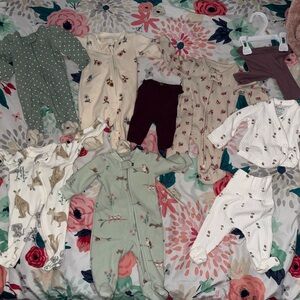 Two Carter’s premie footsies